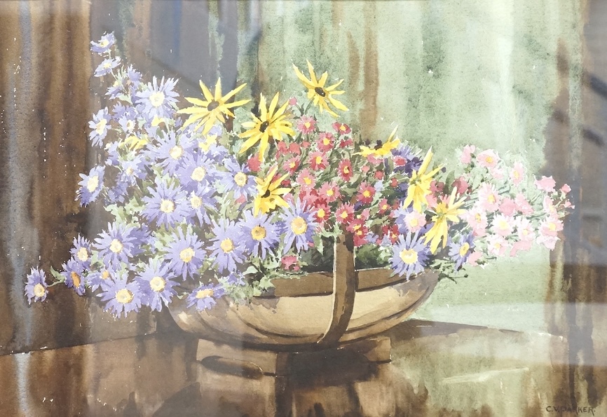 C.V. Parker (20th. C), watercolour, Still life of flowers in a trug, signed, 40 x 59cm
